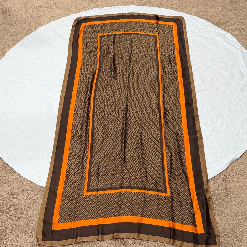 Elegant Brown and Orange Patterned Scarf